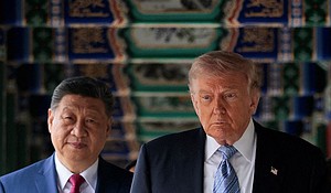 US President Donald Trump walks through Zhongnanhai Garden with Chinese leader Xi Jinping in Beijing, China, on May 15.