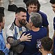 Lionel Messi with his father
