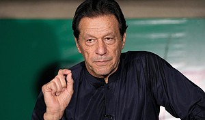Pakistan's former Prime Minister Imran Khan gives a press conference at his home, in Lahore, Pakistan, on May 18, 2023.