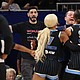 Former basketball player Enes Kanter Freedom and Natasha Cloud #9 of the Chicago Sky yell at one another during the Sky and Indiana Fever game on August 23.