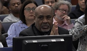 Duane Davis listens as closing arguments come to an end on August 31.