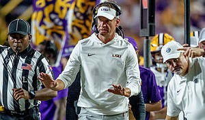 LSU head coach Lane Kiffin reacts during his team's blowout win over Clemson on Saturday