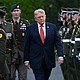 President Donald Trump inspects an honor guard as he attends a welcoming ceremony in the Irish capital of Dublin on Saturday.