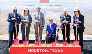 Officials pose at the groundbreaking of Eli Lilly and Co.'s $6.5B biomanufacturing facility at Generation Park in Houston on Monday