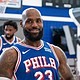 Philadelphia 76ers' LeBron James reacts as he goes between stations during the NBA basketball team's media day in Camden, New Jersey.