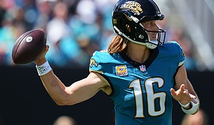 Jaguars QB Trevor Lawrence throws a pass against the New England Patriots in the second quarter at EverBank Stadium on September 27 in Jacksonville, Florida.