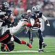 The Houston Texans' Reed Blankenship tackles the Dallas Cowboys' Ryan Flournoy on Sunday.