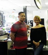 Kamla Hodges-Ronan and Harold Davis stand inside they're newly opened joint venture, 79th Street Indoor Mall, 1708 E. 79th St. Photo/Deborah Bayliss