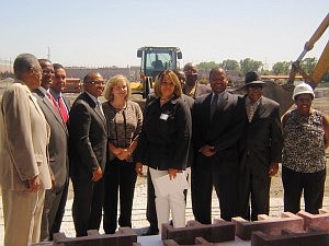 Several dignitaries were on hand for the Walmart groundbreaking.  (L to R)  Former State Senator Howard Brookins, Sr., Willie Brown, A.C. Brown Construction Company, Inc., Labeed Diab, vice president and general manager, Walmart, Ald. Howard Brookins, Jr. (21st), Julie Murphy, senior vice president, Walmart U.S., Sandra Harrison, president, West Chatham Improvement Association, State Senator Emil Jones III (D-14), Rev. Dr. Howard Randolph, New Faith M.B. Church, Ald. Roderick Sawyer (6th), William Garth, Sr., publisher, Chicago Citizen Newspaper Group, Inc., and State Rep. Monique Davis (D-27).  (Photo by Thelma Sardin)