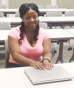 Africa Page participated in the City Colleges of Chicago's Level Up program to help boost her to regular college-level math and English courses. Photo by Rhonda Gillespie