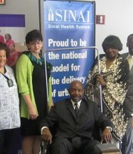 (L to R) Michele Mazurek, R.N., Mt. Sinai Hospital, Alison Smith, VP Operations, Gift of Hope, Cook County Commissioner Robert Steele, Debra Wesley, Sinai Health System and Jackie D. Lynch, director of community affairs, Gift of Hope pose for a photo following Aug. 1's press conference observing National Minority Donor Awareness Day. (Photo by Thelma Sardin)