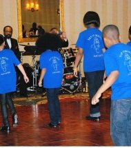 The Archdiocese of Chicago reported in January that Catholic elementary school enrollment has seen a surge for the second consecutive year. Shown here, St. Sabina Academy students  perform at the school board's annual scholarship gala. (Photo Courtesy of St. Sabina Academy)