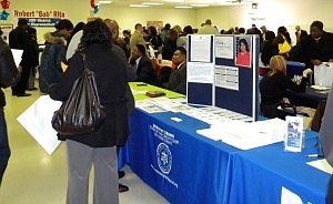 On November 17, 2011, hundreds gathered at the Calumet Township Center awaiting the chance to hand off their resumes to potential employers.  Photo:  Abbrea Stiffend