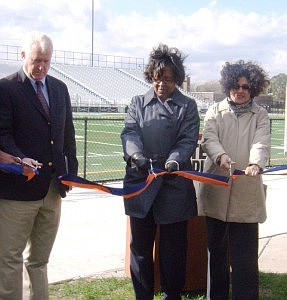 Patrick McCaskey, Bears Director of Special Projects, Ald. Michelle Harris (8th Ward) and Susana Vasquez, Executive Director of LISC/Chicago cut the ceremonial ribbon at the newly renovated Gately Stadium.