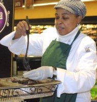 Jacqueline Grant offered samples of Grandma Maud's-brand black-eyed peas and sweet potato pie at the Jewel store at 17705 S. Halsted in south suburban Homewood. Photo by Rhonda Gillespie