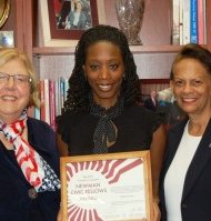 Dr. Elaine P. Maimon, president of Governors State University (left), and Dr. Sherilyn Poole, Associate Vice President for Student Affairs and Dean of Students (right), stand with Tamara Lewis (center), recipient of the Newman Civic Fellow award and coordinator of the"All Nations for Haiti" fashion show.