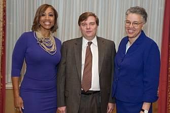 Cheryl Pearson-McNeil, Senior VP of The Nielsen Company (left), and Laurent Guerard VP,  A.T. Kearney  -(center) who are co-chairs of  Executives Club Civic Affairs Committee -  welcome Toni Preckwinkle, Cook County Board President (right.)