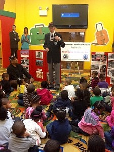 Liaison Pilot Maj. Welton I. Taylor, a Tuskegee Airman, speaks to a group of children at Bronzeville Childrens Museum Feb. 1.