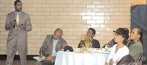 Gyata Kimmons, Chicago 2016 community relations director, talked to members of the Chatham Business Association about how they can participate in the Summer Olympic Games. Photo by: Lesley R. Chinn.