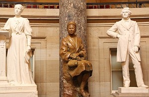 Rosa Parks’ statue is located in the Capitol’s Statuary Hall,  positioned between those of suffragist Frances E. Willard and John Gorrie, considered the father of refrigeration and air conditioning.